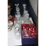 VARIOUS CUT/CLEAR GLASS DECANTERS, to include two silver collared, boxed Tutbury etc (9)