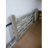 A LARGE OAK FIVE BAR GATE, approximate size length 289cm x height 114cm and a smaller gate