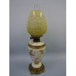 A ROYAL WORCESTER OIL LAMP, the baluster body decorated with floral sprays, Hinks & Sons burner,