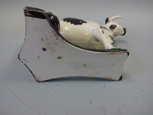 A 19TH CENTURY YORKSHIRE ? PEARLWARE COW CREAMER, decorated in black and white enamels with - Image 5 of 5