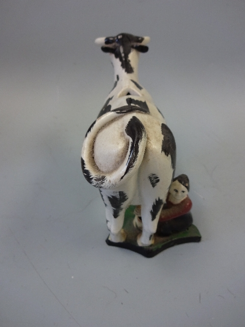 A 19TH CENTURY YORKSHIRE ? PEARLWARE COW CREAMER, decorated in black and white enamels with - Image 4 of 5