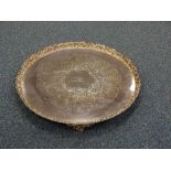 A HEAVY SILVER PLATED CIRCULAR TRAY, with repousse scroll, floral and fruit border to similar