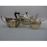 A SILVER ART DECO THREE PIECE TEA SERVICE, teapot with ebonised handle and finial, Birmingham