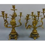 A PAIR OF 19TH CENTURY XVI STYLE GILT CANDELABRA, the five different level branches rising from