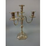 A SILVER PRESENTATION FOUR BRANCH CANDELABRA, with central urn candlestick supporting three 'S'