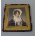 A PORTRAIT MINIATURE, depicting seated lady in bonnet on a red chair, approximately 10cm x 8.5cm