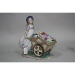 A BOXED LLADRO FIGURE, 'Love's Tender Tokens' No.6521