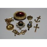 A SMALL COLLECTION OF JEWELLERY, to include two fobs, necklace, glass brooch and charms, (sd)