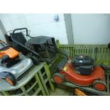 A CHAMPION PETROL SELF PROPELLED LAWN MOWER, with grassbox
