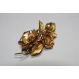 AN 18CT GOLD BROOCH, designed as a spray of roses, hallmarks for Birmingham, weight approximately