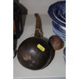 A CARVED CALABASH PIPE, with moulded pottery bowl, length approximately 40cm