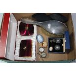 A BOX OF MISCELLANEOUS, to include brooches, silver mounted hair brush, cigarette case, compact,