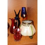 A GROUP OF COLOURED GLASS, to include Loetz style lustre pot pourri footed vase (a/f to metal