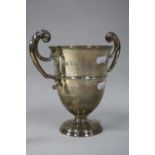 A PRESENTATION TWIN HANDLED SILVER TROPHY CUP, with inscription Mrs Paull with many thanks from