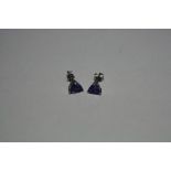 A PAIR OF TANZANITE EARRINGS, of triangular shape, stamped 14k