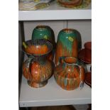 A WADE 'ORCADIA' WARE TWIN HANDLED VASE, a pair of 'Roskyl' vases and a Samford Ware jug, all with