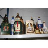 ELEVEN WADE WHISKY DECANTERS, to include Christmas 1990 (x2), Christmas 1993, Princess Eugenie, 12