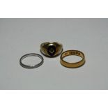 THREE RINGS, to include a platinum band, 2 grams, a 22ct gold band, 3 grams and a signet ring,