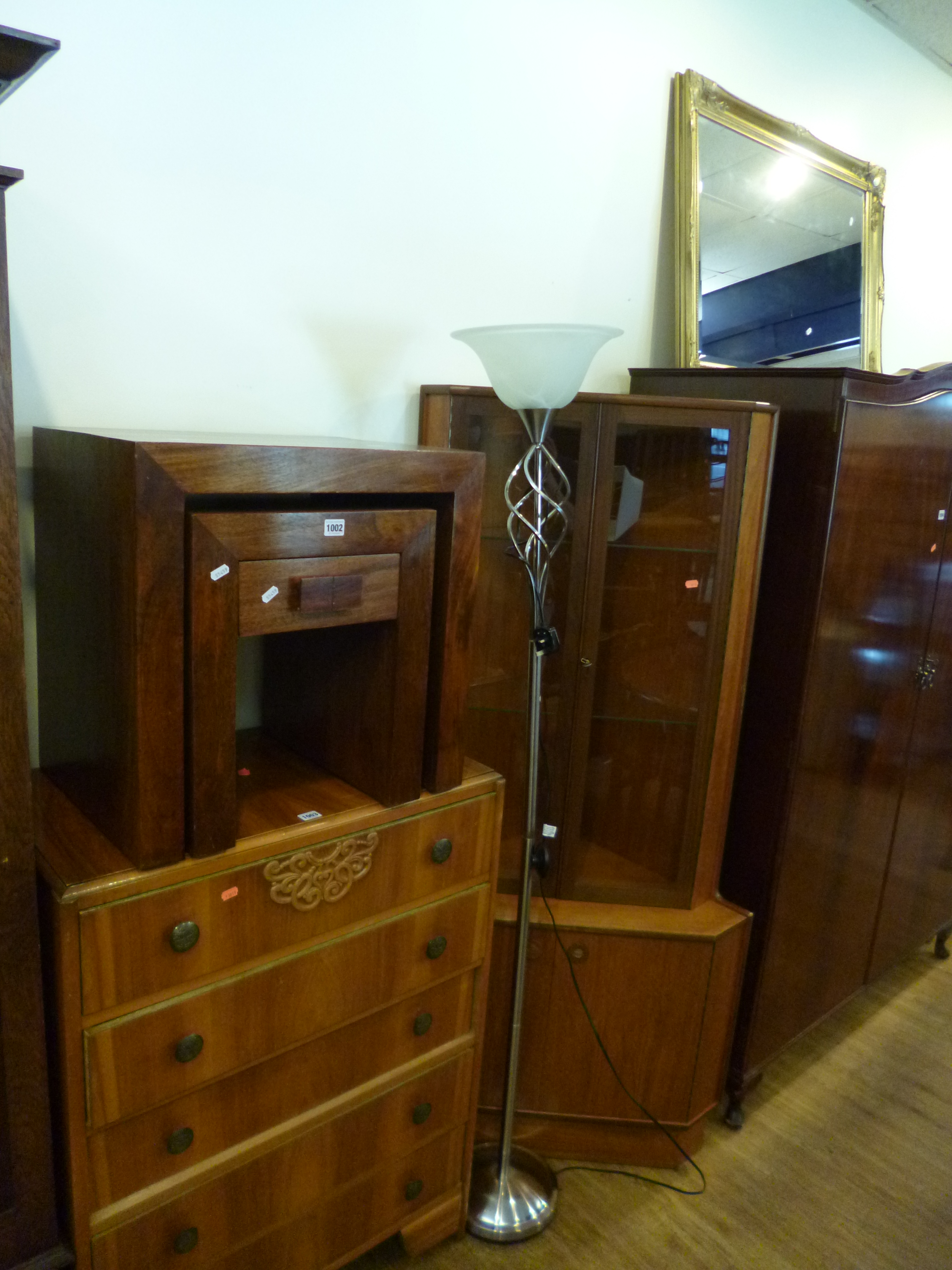 A MODERN NEST OF TWO TABLES, gilt framed bevelled mirror and a chrome uplighter standard lamp (3)