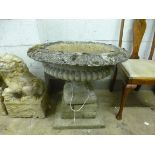 A LARGE COMPOSITE URN, on seperate base