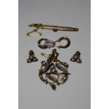 A COLLECTION OF JEWELLERY, to include two pairs of earrings and two brooches