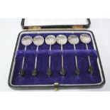 A CASED SET OF SIX SILVER COFFEE SPOONS, with coffee bean terminals, Birmingham 1926