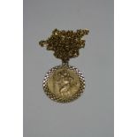 A 9CT GOLD ST CHRISTOPHER PENDANT, to a fine chain, hallmarks for London, length 82cm, weight