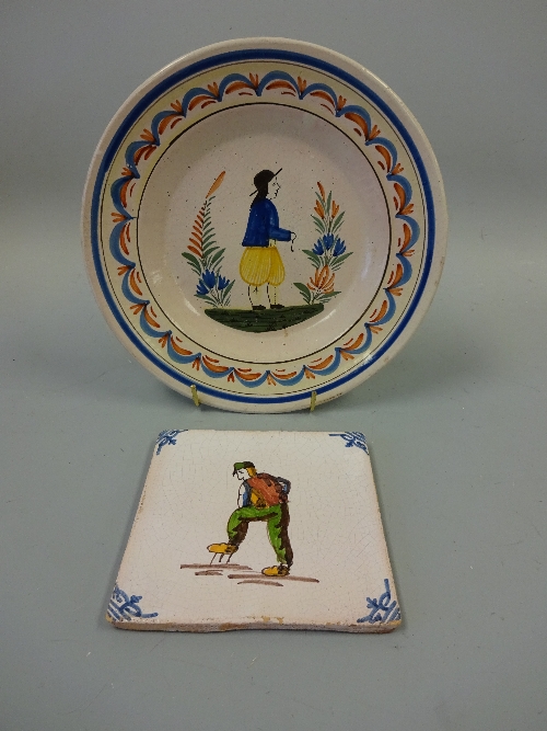 A DELFT PLATE, depicting traditionally dressed gent with pipe, approximately 22.5cm diameter,