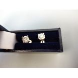 A PAIR OF PLATINUM DIAMOND EAR STUDS, estimated total diamond weight 1.00ct, SI2-PI clarity, G-H