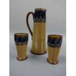 A ROYAL DOULTON LAMBETH JUG, of tapering ribbed cylindrical form with fern and roundel decoration to
