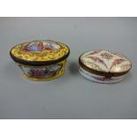 TWO 19TH CENTURY ENAMELLED OVAL TRINKET BOXES, the first with hand painted floral decoration with