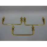 A COLLECTION OF 19TH CENTURY BRASS PEW END SWING HANDLES, with fleur de lys mounting brackets,