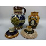 ROYAL DOULTON LAMBETH COMMEMORATIVE JUGS, General Gordon, approximately 19cm high, and Queen