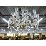 A GLASS TWO TIER NINE BRANCH CHANDELIER WITH DROPPERS (sd)