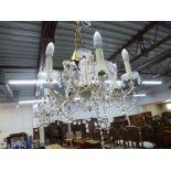 A GLASS SIX BRANCH CHANDALIER WITH DROPPERS (sd)