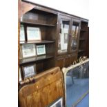 AN 'ERCOL' OAK THREE SECTION WALL UNIT