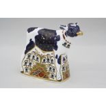 A BOXED LIMITED EDITION ROYAL CROWN DERBY PAPERWEIGHT, 'New Year Calf' No.289/1000 (certificate)