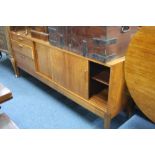 A 1970'S TEAK SIDEBOARD, with three drawers and cupboard with sliding doors, approximate size length