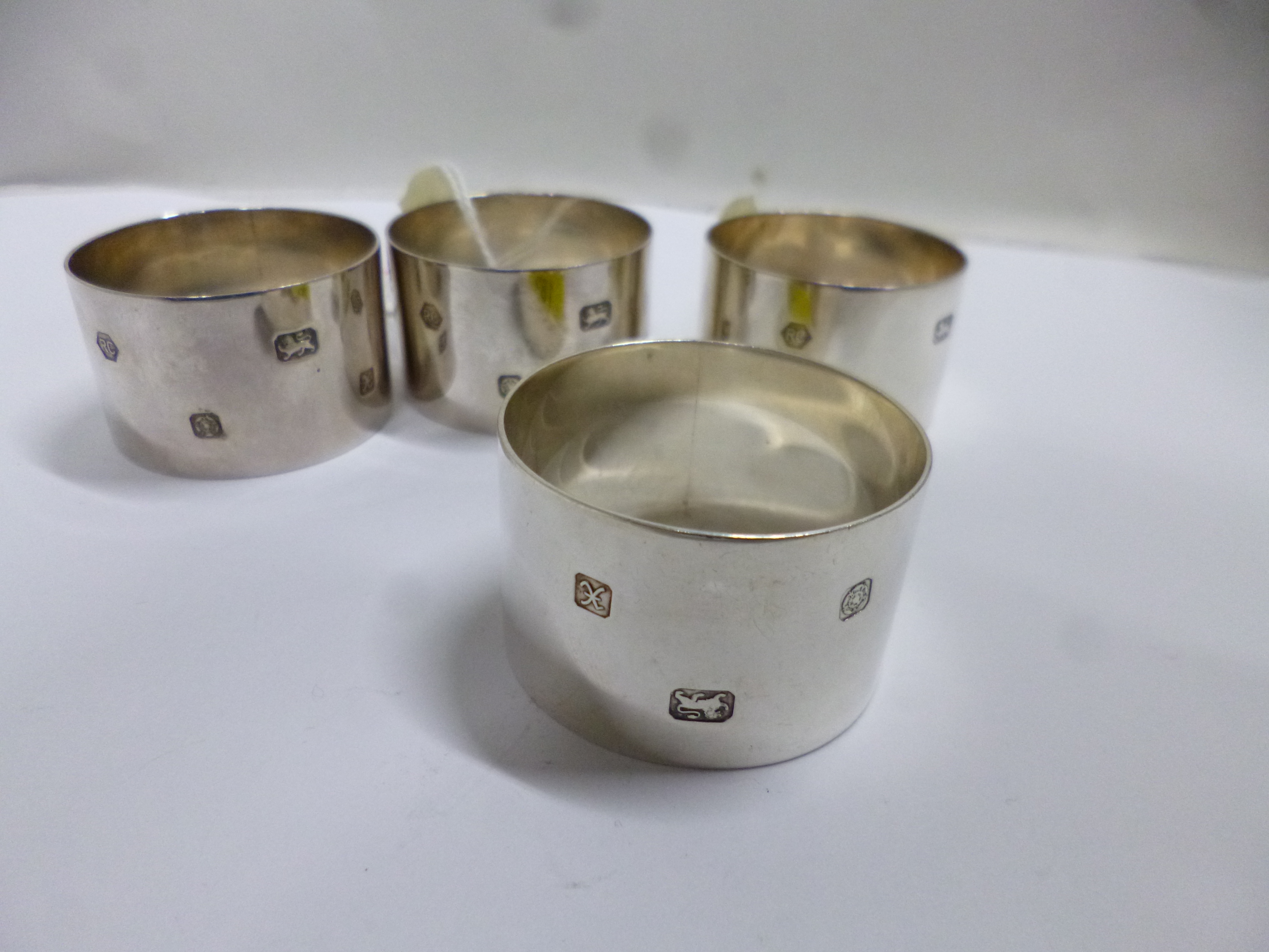 FOUR SILVER NAPKIN RINGS, Sheffield 1997, approximately 4ozt