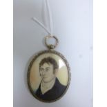 A MINIATURE PORTRAIT, of Regency gentleman within a fancy scrolling gilt frame, dimensions 8cm x