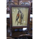 AN OAK FRAMED FIRESCREEN, with inset painted panel depicting 'Dead Game', signed G Hopper 1936