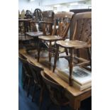 FOUR VICTORIAN KITCHEN CHAIRS, with solid central splats with roundrel detail and a similar chair (