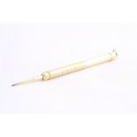 A 14CT GOLD TELESCOPIC PROPELLING PENCIL, extends from 55cm to 12cm