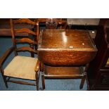 AN OAK DROP LEAF TEA TROLLEY, and a ladder back armchair (2)