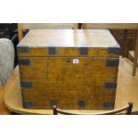 AN OAK BRASS BOUND CHEST, (handles missing) 'British Railways Travel' label attached dated 1961