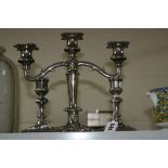 A PLATED CANDELABRA, and a pair of candlesticks (3)