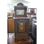 AN EDWARDIAN MAHOGANY INLAID MIRROR BACK PURDONIUM