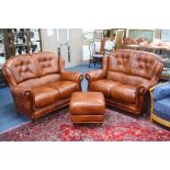 A PAIR OF BROWN LEATHER TWO SEATER SETTEES and a matching pouffe (Bardi label attached to pouffe) (