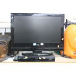 A TOSHIBA 26' LCD TV, a Panasonic DVD recorder (remote to dvd)