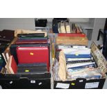 AN ACCUMULATION OF STAMPS, in albums and loose with Great British mint decimal issues to 2006,